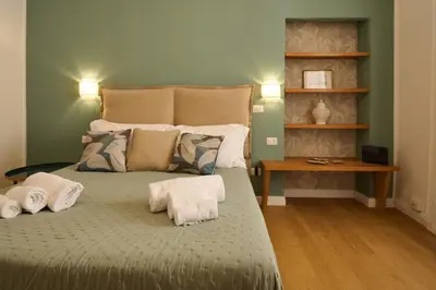 Letto o letti in una camera di Casa Lungomare Ortigia