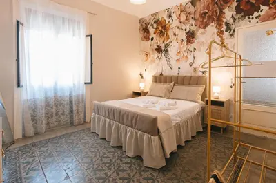 Letto o letti in una camera di Eda Apartment Affaccio sul porto