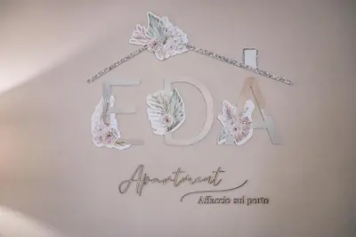 Certificato, attestato, insegna o altro documento esposto da Eda Apartment Affaccio sul porto