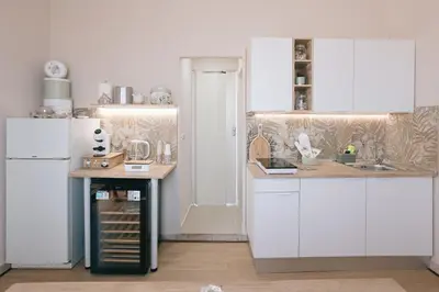 Cucina o angolo cottura di Eda Apartment Affaccio sul porto