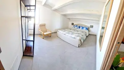 Letto o letti in una camera di Villa LORY SWEET GARDENIA