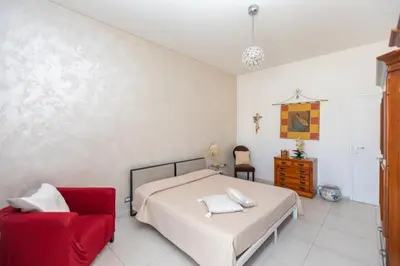 Letto o letti in una camera di Poseidone Apartment