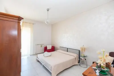 Letto o letti in una camera di Poseidone Apartment