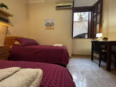Letto o letti in una camera di Casa del Collegio