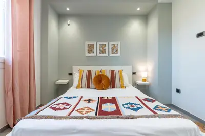 Letto o letti in una camera di Perla del Mare Gialla