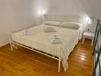 Letto o letti in una camera di Casa Dolce Sonia
