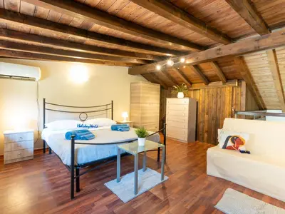 Letto o letti in una camera di Casa Domiziano by Holiday World
