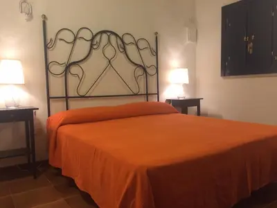 Letto o letti in una camera di Casa dei Limoni