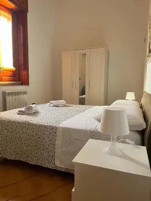 Letto o letti in una camera di Rooms Station