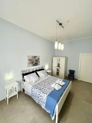 Letto o letti in una camera di a casa rà Palumma Rooms