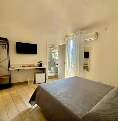 Letto o letti in una camera di Borgo Sant Agata