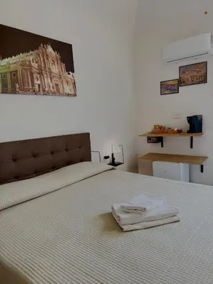 Letto o letti in una camera di Borgo Sant Agata