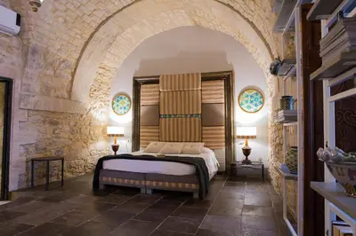 Letto o letti in una camera di Luxury Cave Modica