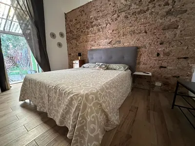 Letto o letti in una camera di Dimora San Damiano