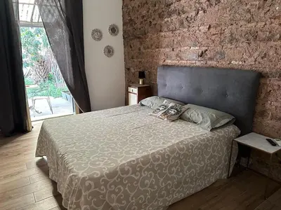 Letto o letti in una camera di Dimora San Damiano