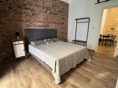 Letto o letti in una camera di Dimora San Damiano