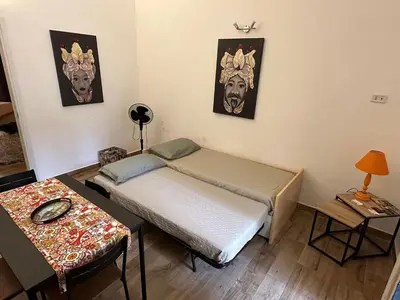 Letto o letti in una camera di Dimora San Damiano