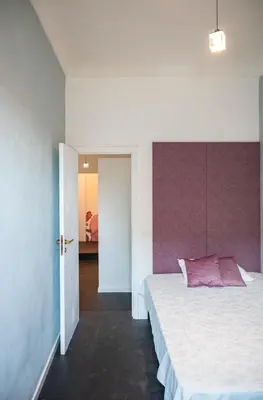Letto o letti in una camera di Regina Margherita Luxury House