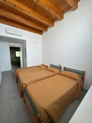 Letto o letti in una camera di Maruta Siracusa