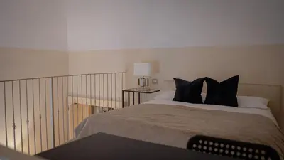 Letto o letti in una camera di La Dimora al Duomo - Elegant Historic Stay in Centro Catania by Duomo