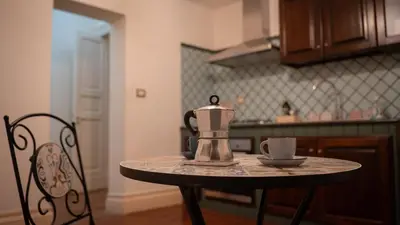 Cucina o angolo cottura di La Dimora al Duomo - Elegant Historic Stay in Centro Catania by Duomo