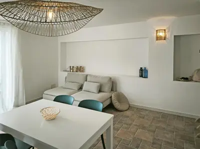 Area soggiorno di Corner of paradise by the sea - At Home Sicily