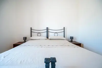 Letto o letti in una camera di Villa Mandaré - Fontane Bianche
