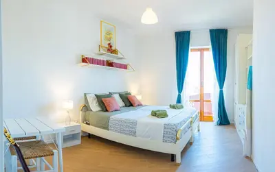 Letto o letti in una camera di Pina'Mmari
