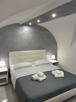 Letto o letti in una camera di La 75 Stella Home Catania