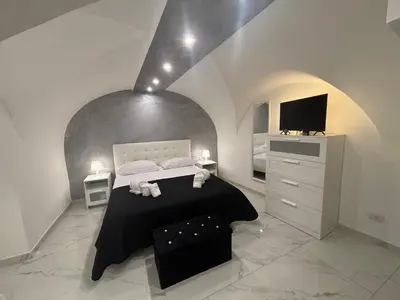 Letto o letti in una camera di La 75 Stella Home Catania