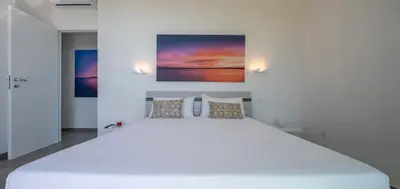 Letto o letti in una camera di Villa Plemmirio Seaview