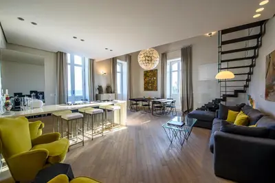 Area soggiorno di Lucea Sea Terrace by Ortigiapartments