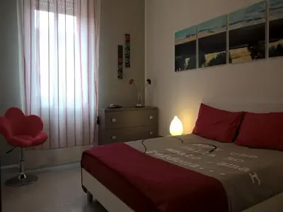Letto o letti in una camera di Casa Vacanze A Pennichella