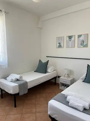 Letto o letti in una camera di Le due isole - Marzamemi