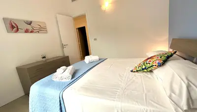 Letto o letti in una camera di Villa Avola Antica