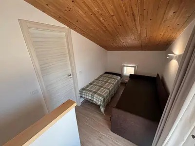 Letto o letti in una camera di Flamingo Apartment