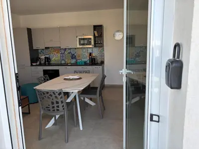 Cucina o angolo cottura di Flamingo Apartment