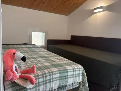 Letto o letti in una camera di Flamingo Apartment