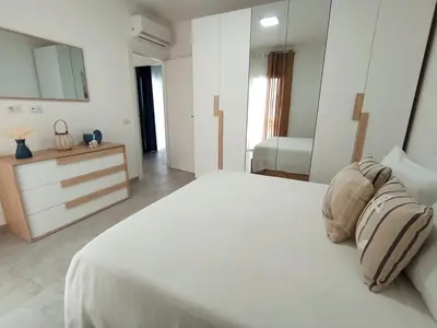 Letto o letti in una camera di Oasi di Brucoli