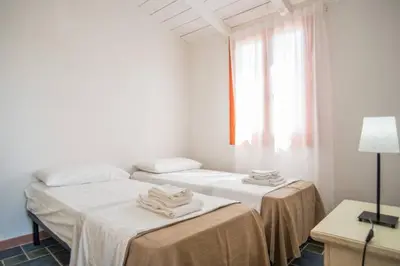 Letto o letti in una camera di Agriturismo Agrimaccari Marzamemi-Vendicari - Esperienza autentica siciliana