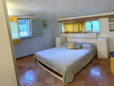 Letto o letti in una camera di Casa del Cedro