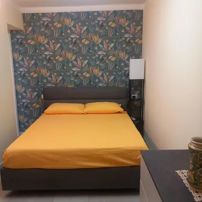 Letto o letti in una camera di Novantotto