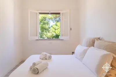 Letto o letti in una camera di Villa Horama - Waterfront with Infinity Pool