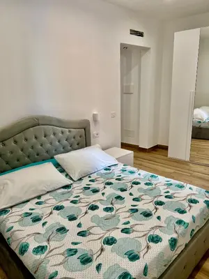 Letto o letti in una camera di Menotti Appartment