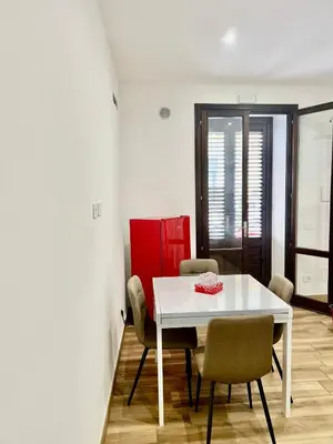 Area soggiorno di Menotti Appartment