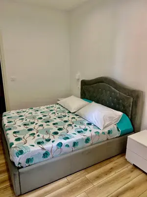 Letto o letti in una camera di Menotti Appartment