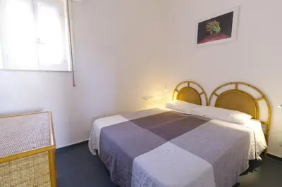 Letto o letti in una camera di Villetta Blu sul Mare a Fontane Bianche by Wonderful Italy