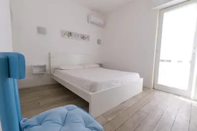 Letto o letti in una camera di Villetta Blu sul Mare a Fontane Bianche by Wonderful Italy