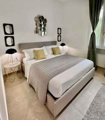 Letto o letti in una camera di Archimede Urban living Syracuse