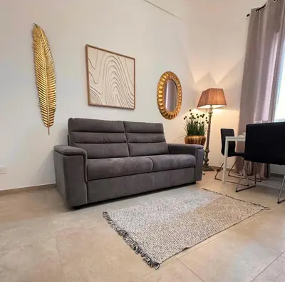 Area soggiorno di Archimede Urban living Syracuse